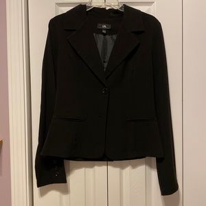 Women’s black blazer.